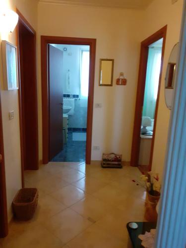 a hallway with a door leading into a room at BED & BREAKFAST Villa Cerasa in Case del Bevano
