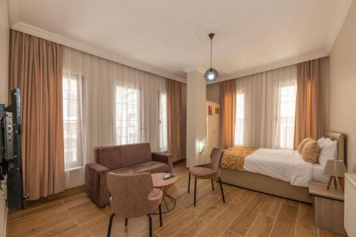 Postel nebo postele na pokoji v ubytování Marida Residence - Istanbul Taksim