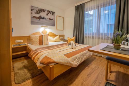 מיטה או מיטות בחדר ב-Haus am Lift