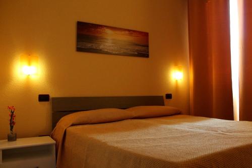 Ліжко або ліжка в номері Villa Verdesca