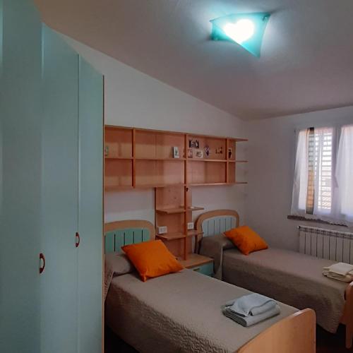 Postel nebo postele na pokoji v ubytování B&B Casa Viola
