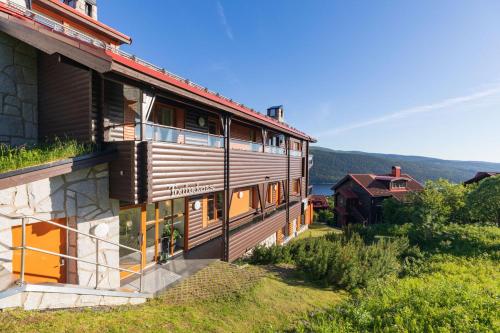 a house on the side of a hill at Åre Travel - Tottbacken in Åre