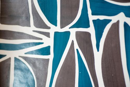 a close up of a painting with blue and white at Insula Boutique Hotel in Procida
