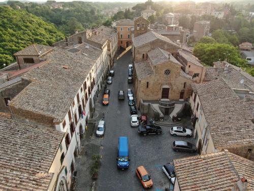 an aerial view of a city with buildings and cars at Palazzo Forlani in Capranica