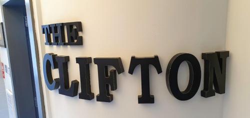 a sign that reads the office hanging on a wall at The Clifton in South Shields