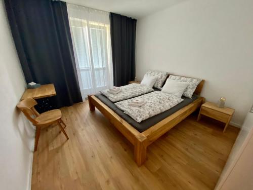 Postel nebo postele na pokoji v ubytování Apartment Poruba GARDEN VIEW