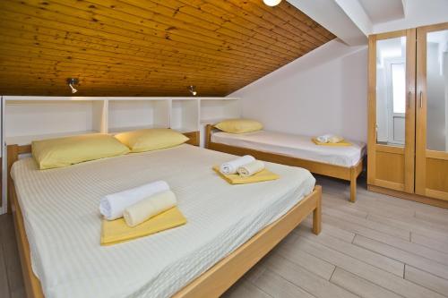 Llit o llits en una habitació de Vila Maria Old Town Hvar
