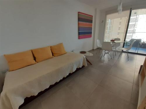 a living room with a large bed in a room at Departamento a estrenar in San Miguel de Tucumán
