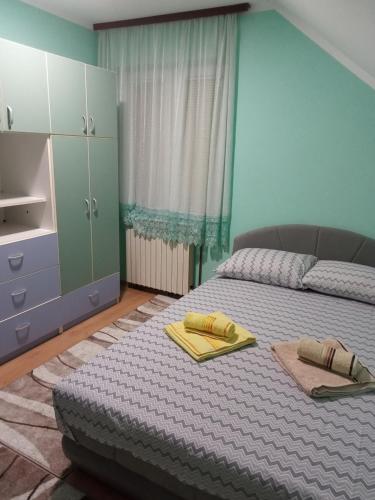 Katil atau katil-katil dalam bilik di Apartman Dunja