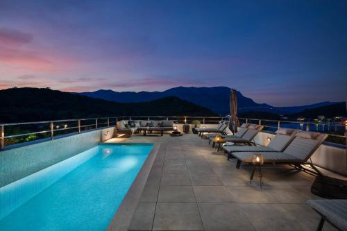 a swimming pool on the roof of a building at Villa Buddha Bay in Korčula