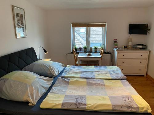 Postel nebo postele na pokoji v ubytování Werners Ferienwohnung