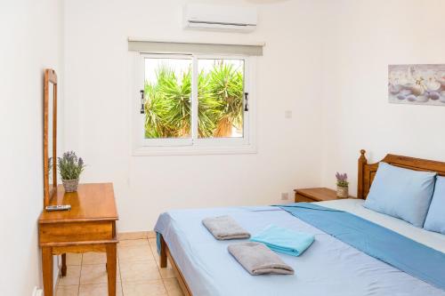 Un pat sau paturi într-o cameră la MyNapa Apartments