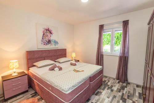 Posteľ alebo postele v izbe v ubytovaní Holiday house Anetta with 5 bedrooms