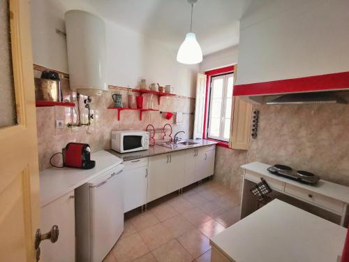 Kjøkken eller kjøkkenkrok på Casa da Ferraria