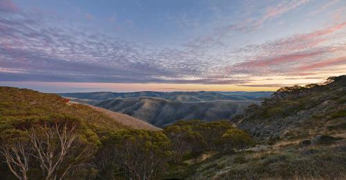 a mountain range with a view of the mountains at Mountain Dreaming in Mount Hotham