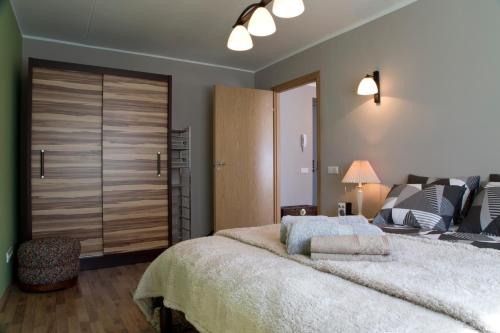Una habitación en Prenzel Apartments - City