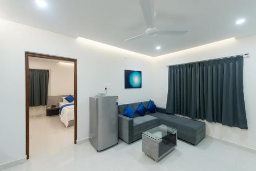 A seating area at Manipal Atalia Service Apartments