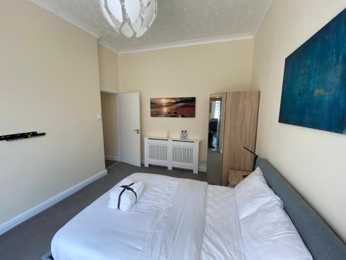 Ένα ή περισσότερα κρεβάτια σε δωμάτιο στο Redcar Seaview Apartments
