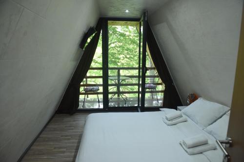 Tempat tidur dalam kamar di Miletic Villas