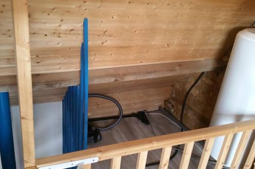 a view of the inside of a room with wood paneling at L'abreuvoir, Gite du 18 siecle, accés indépendant in Carsac-Aillac