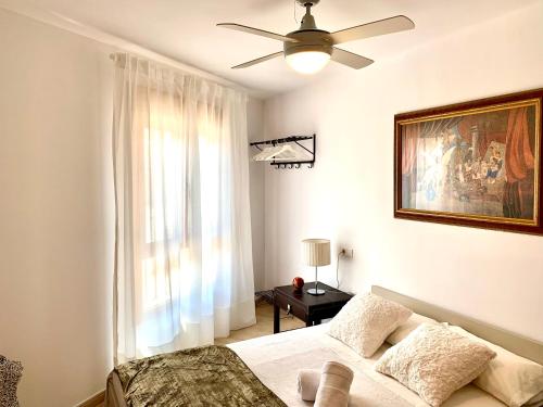 En eller flere senger på et rom på Ideal Apartamento - Guadalest
