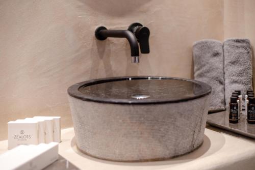 a sink in a bathroom with a faucet at Villa Anemeli in Vóthon