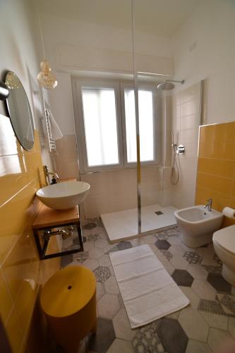 a bathroom with a sink and a toilet and a shower at Ca du Ginetto B & B in Borgio Verezzi