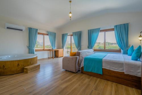 Postel nebo postele na pokoji v ubytování Ada Villa