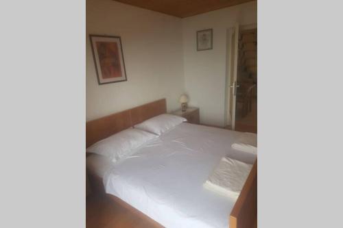 Posteľ alebo postele v izbe v ubytovaní Apartman Nela