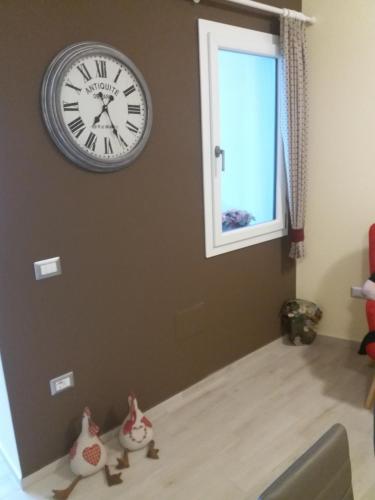 En eller flere senge i et værelse på Casa Giada