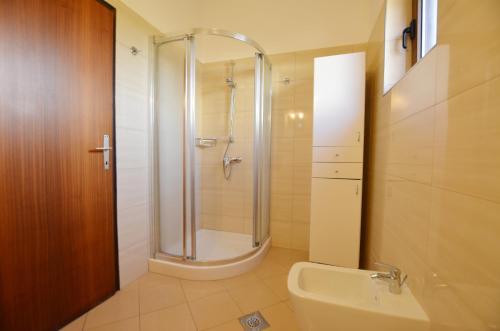 Ванна кімната в Orbanic Apartments Valalta