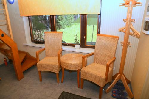 Un lugar para sentarse en Guest House Šampētera māja
