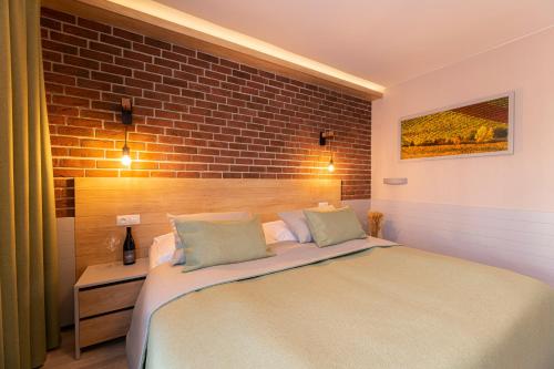 Postel nebo postele na pokoji v ubytování Hotel Aqualand Inn