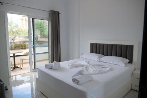 Postel nebo postele na pokoji v ubytování Hotel ZEKA