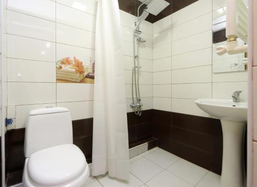 a bathroom with a toilet and a sink at Apartaments on Komitas 20 in Yerevan