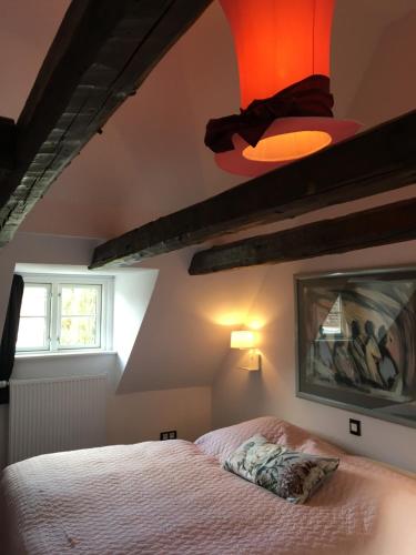 Katil atau katil-katil dalam bilik di Ferienhaus - Sonnenhaus