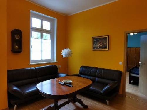 Ruang duduk di Ferienwohnung in der Ciderwirtschaft