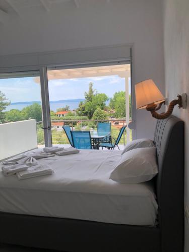 Postel nebo postele na pokoji v ubytování sea view studio