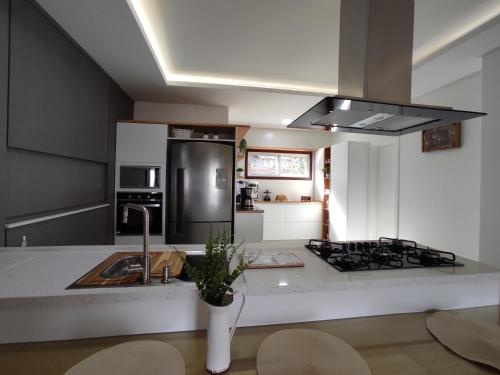 Kuchyň nebo kuchyňský kout v ubytování GRAMADO TOP CENTRO