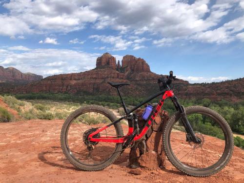 a bike parked on a dirt road in the desert at Sedona Studio at Thunder Mountain in Sedona