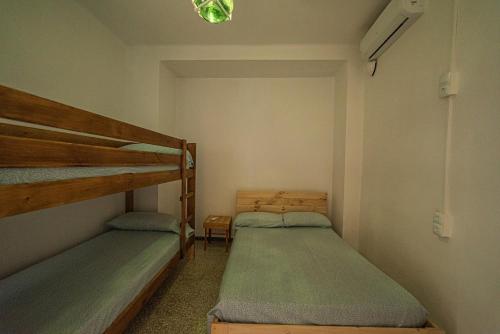 Olvera B&B Hostel en Olveraにあるベッド