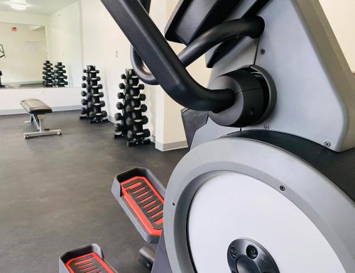a gym with a bunch of treadmills at SureStay by Best Western Albuquerque East I-40 in Albuquerque