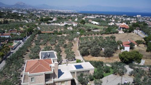 an aerial view of a house in a city at Aphrodite Villa in Loutraki