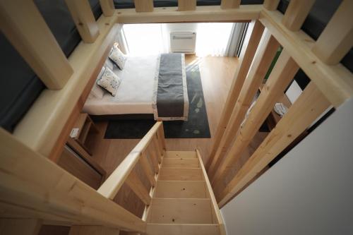 an overhead view of a bedroom in a tiny house at Casa Das Condessinhas in Lousã