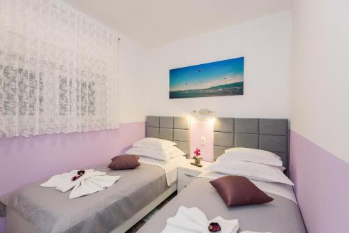 Postel nebo postele na pokoji v ubytování Apartment Sea bass Neretva