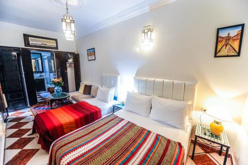 Postel nebo postele na pokoji v ubytování Riad Errabii & Spa