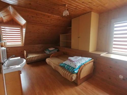 Postel nebo postele na pokoji v ubytování Agroturystyka NOCLEGI U LATKI