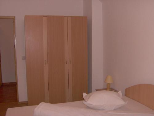 Łóżko lub łóżka w pokoju w obiekcie Vila Iulia