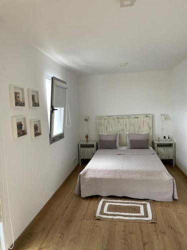 Postel nebo postele na pokoji v ubytování Casa Amarela - Rua Cidade de New Bedford