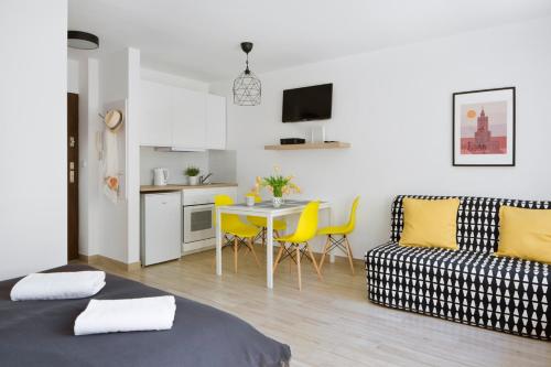 Kuchyň nebo kuchyňský kout v ubytování Flat Złote Tarasy Street